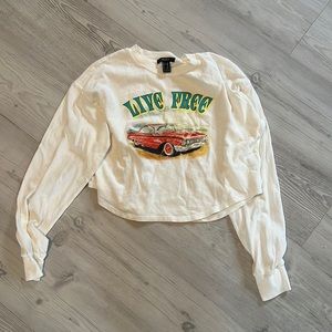 Distressed cropped long sleeve graphic t